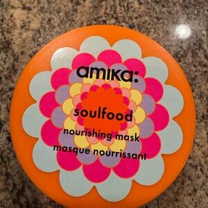 Amika Soulfood Mask with Orange and Pink Floral Design